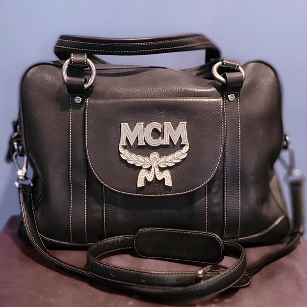 MCM black leather bag with cross body, purse, business, or small laptop